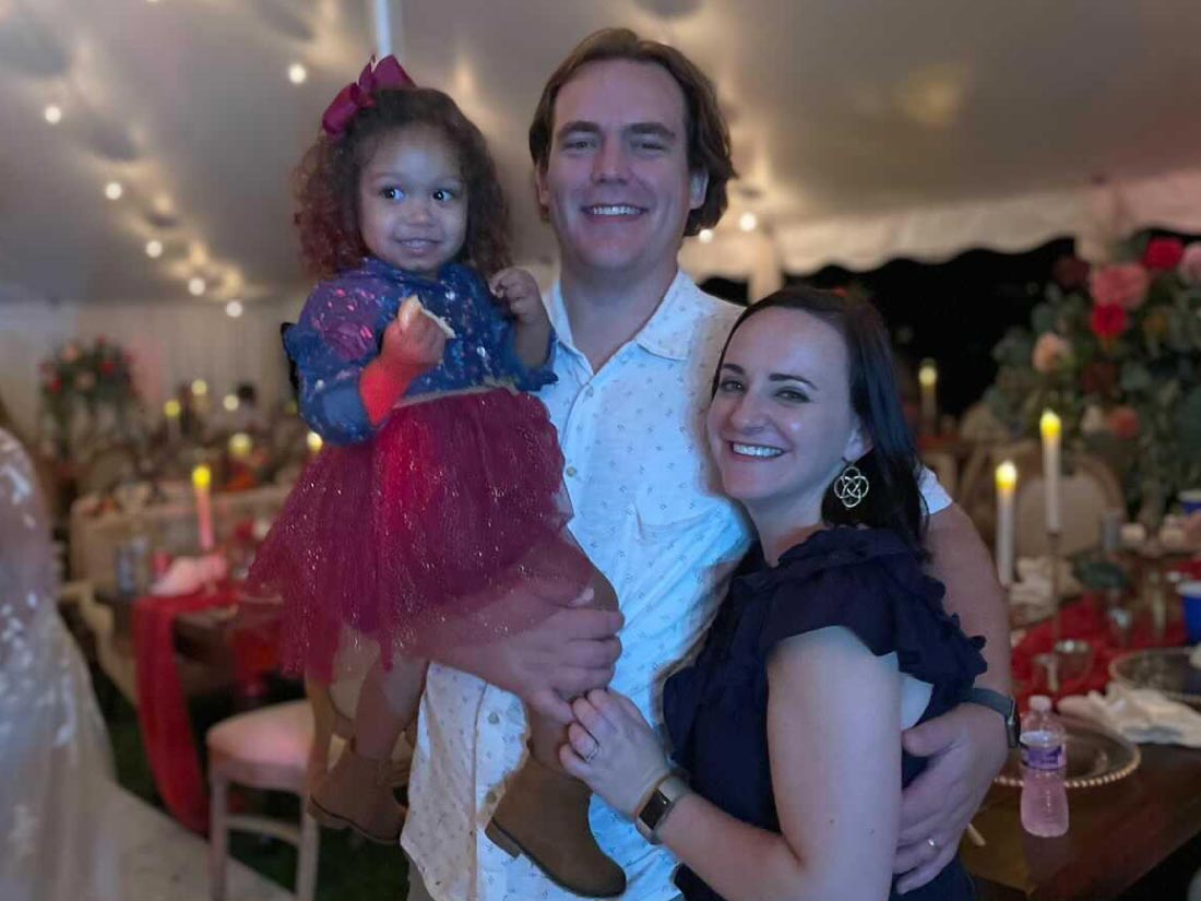 Adoptive family at dinner