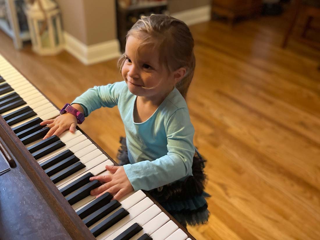 Child playing piano